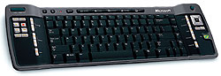 Microsoft Remote Keyboard Windows XP Media Center Edition ($60) — это не только клавиатура, но и пульт управления медиацентром