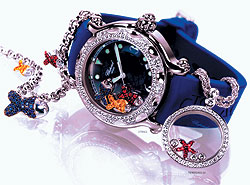  В иных часах и украшениях Chopard плавают не только белые бриллианты, но и украшенные драгоценными камнями крошечные рыбки, солнца и морские звезды 