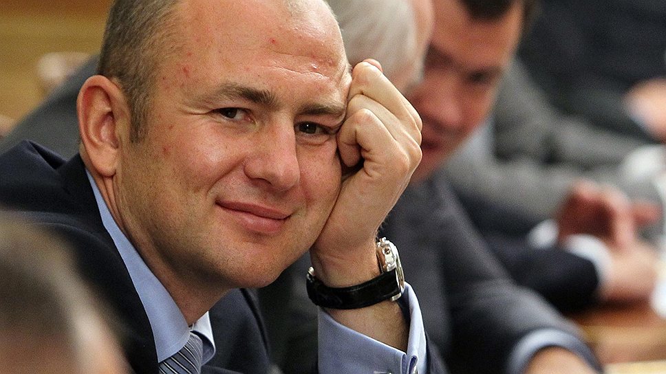 Президент компании "Интеррос" Владимир Потанин (слева) и председатель совета директоров МХК "Еврохим" Андрей Мельниченко (справа) 