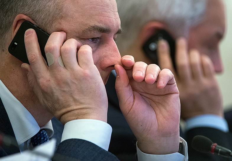 Министр финансов России Антон Силуанов (слева) и помощник президента России Андрей Белоусов (справа), 2014 год 