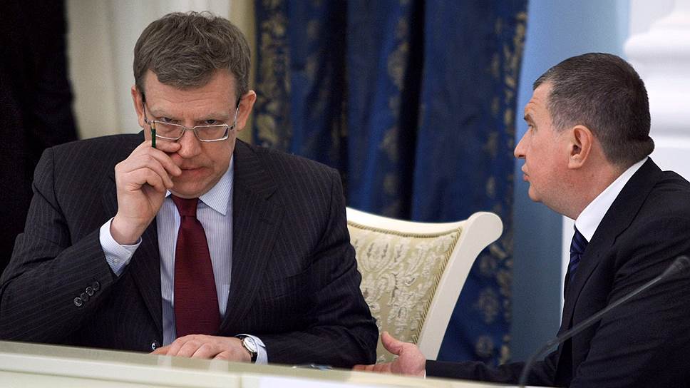 Бывший глава Минфина Алексей Кудрин (слева) и президент «Роснефти» Игорь Сечин