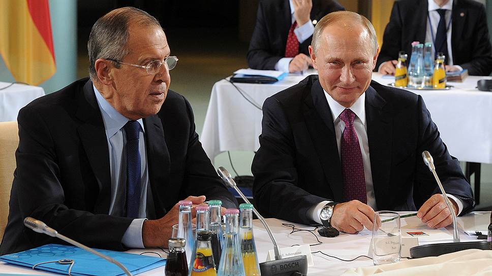 Министр иностранных дел России Сергей Лавров и президент России Владимир Путин 