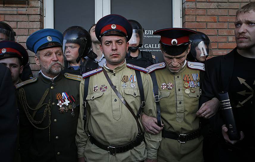 20 сентября 2012 года около 100 казаков и православных активистов попытались сорвать открытие выставки «Духовная брань» в галерее Марата Гельмана, подготовленной в поддержку участниц Pussy Riot. Они заблокировали вход, скандировали: «Христос воскресе!» — и призывали организаторов выставки покаяться. Полиция задержала около 10 активистов для проведения «профилактической беседы» 
