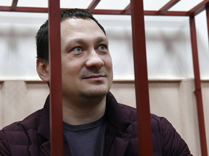 9 июня в интервью в , не показывая лица, рассказал, что Иван Голунов попал в разработку полицейских еще в начале марта. Он пообещал предоставить доказательство того, что журналист «распространял наркотики в ночных клубах». Имя сотрудника полиции в сюжете не называлось. 29 января 2020 года задержан в рамках расследования уголовного дела, возбужденного по п. «в» ч. 3 ст. 286 УК РФ (превышение должностных полномочий с причинением тяжких последствий). На следующий день Басманный суд Москвы арестовал его на два месяца. Сообщалось, что арестованный ранее обвинялся в подбрасывании наркотиков коллеге в Краснодаре. В мае 2021 года был приговорен к 12 годам колонии общего режима за незаконное задержание и фальсификацию доказательств против журналиста. В марте 2022 года суд смягчил наказание до 11,5 лет
