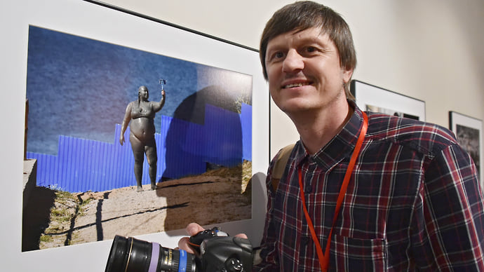 Нападению на фотокорреспондента “Ъ” подберут статью