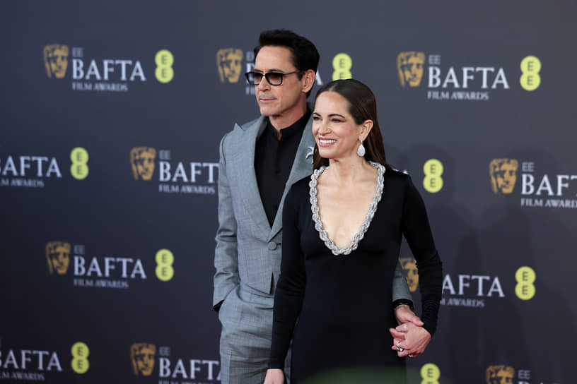 Лучшим актером второго плана за роль в фильме «Оппенгеймер» признан Роберт Дауни-младший   На фото: вместе с супругой Сьюзан 