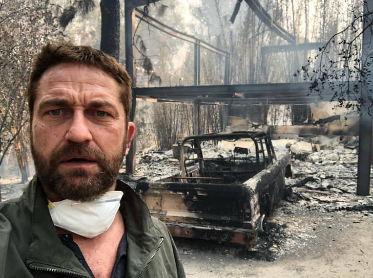 Актер Джерард Батлер у своего сгоревшего дома 