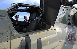 Рабочая поездка президента России Дмитрия Медведева в Южный федеральный округ. Президент России Дмитрий Медведев (справа) во время посещения в городе Кореновске 393-й Севастопольской авиационной базы армейской авиации 