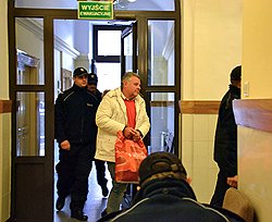 Бывший заместитель прокурора Московской области Александр Игнатенко, обвиняемый в получении взяток и объявленного в международный розыск, перед началом заседания суда