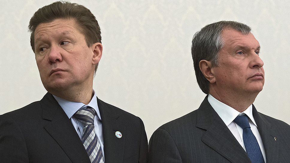 Председатель правления компании "Газпром" Алексей Миллер (слева) и президент, председатель правления ОАО "НК "Роснефть" Игорь Сечин (справа) 