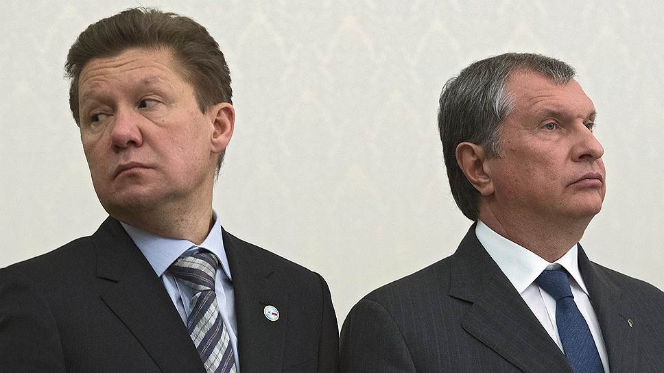 Председатель правления компании "Газпром" Алексей Миллер и президент, председатель правления ОАО "НК "Роснефть" Игорь Сечин