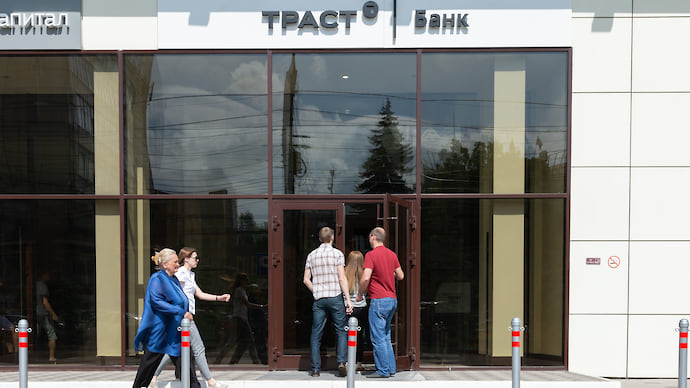 «Открытие холдинг» припугнули банкротством