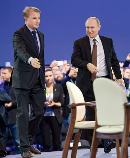 Председатель правления Сбербанка Герман Греф (слева) и президент России Владимир Путин