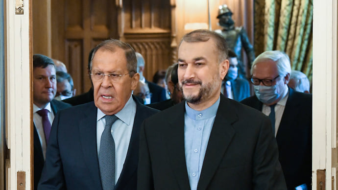 Кому и Тегеран миротворец