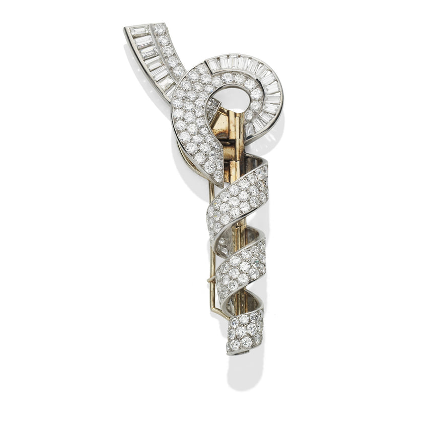 Лот 29 на аукционе Bonhams London Jewels. Брошь из платины и золота с бриллиантами, Van Cleef & Arpels, 1935 год. Собственность актрисы Джоан Коллинз. Эстимейт: £15 - 20 тыс. (1,5 - 2 млн рублей)