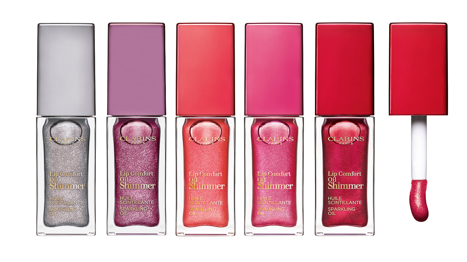 Clarins, мерцающее масло для губ с насыщенным цветом Lip Comfort Oil Shimmer. В его составе – масла макадамии, лесного ореха и жожоба. 
