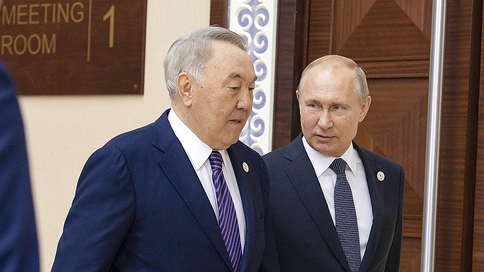 Первый президент Казахстана Нурсултан Назарбаев (слева) и президент России Владимир Путин