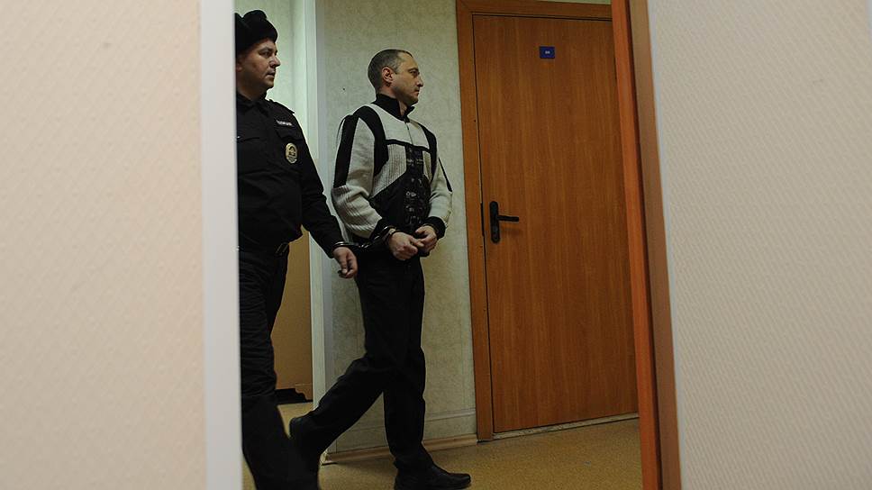 Заместитель руководителя 2-го отдела по расследованию особо важных дел Следственного комитета Кемеровской области Сергей Крюков во время судебного заседания в Центральном районном суда города Новосибирска. 