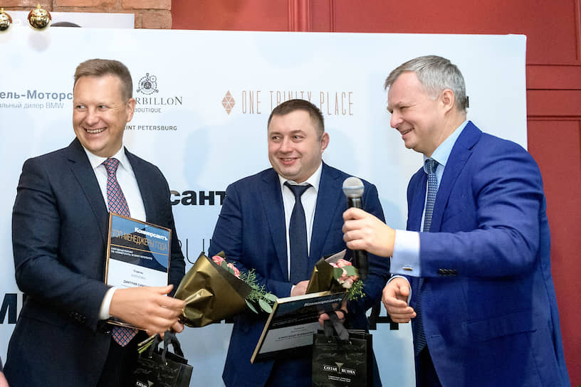  Генеральный директор компании "ЛОЭСК" Дмитрий Симонов (слева) и генеральный директор РКС-энерго Александр Борошнин (в центре) 