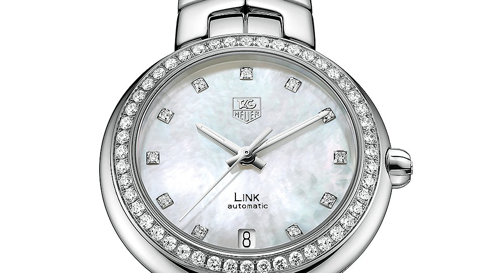Выбор Юлии Снигирь: TAG Heuer Link Lady Automatic, часы с корпусом из стали диаметром в 34,5 мм. На циферблате — 11 белых бриллиантов, а на безеле — еще 59 драгоценных камней общим весом в 0,9 карата. Внутри установлен механический калибр TAG Heuer Calibre 7, обеспечивающий функции GMT, дату и запас хода на 46 часов. Частота механизма TAG Heuer Calibre 7 составляет 28 800 полуколебаний в час.