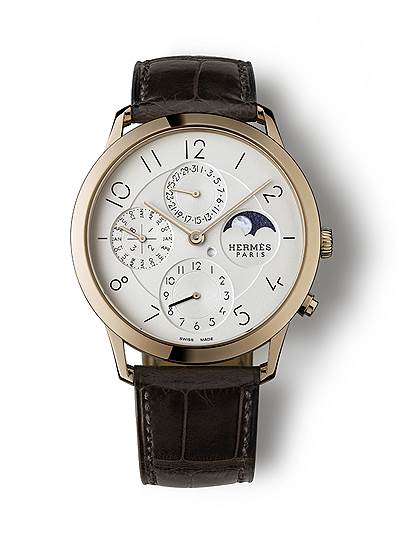 Hermes Slim d'Hermes QP получили приз в номинации "Календари". В разработке их дизайна поучаствовал известный французский художник, типограф, плакатист и каллиграф Филипп Апелуа