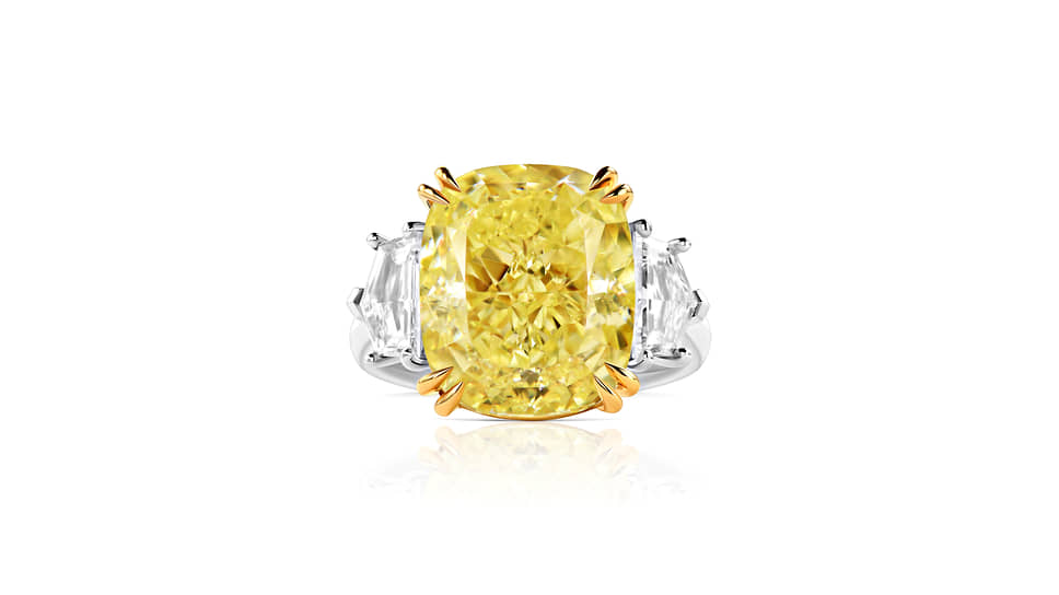 Кольцо, белое и желтое золото, желтый бриллиант (10,06 карата), бесцветные бриллианты (общим весом 0,79 карата) 