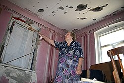 Варвара Бекоева не смогла перенести парализованного мужа в подвал и все три дня войны провела в доме, по которому велся обстрел