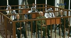 Для того чтобы приговорить Азиза к смертной казни, потребовалось три судебных процесса (на фото — первый из них)