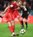 Октябрь. Москва. Игрок «Спартака» Денис Глушаков во время матча Кубка России по футболу между командами «Спартак» (Москва) и «Спартак-Нальчик» (Нальчик) на стадионе «Открытие Арена»