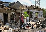 Последствия обстрела жилого дома украинским БПЛА в Донецке